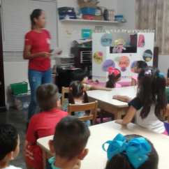 Mar teaching the younger kids during a VBS camp we led.